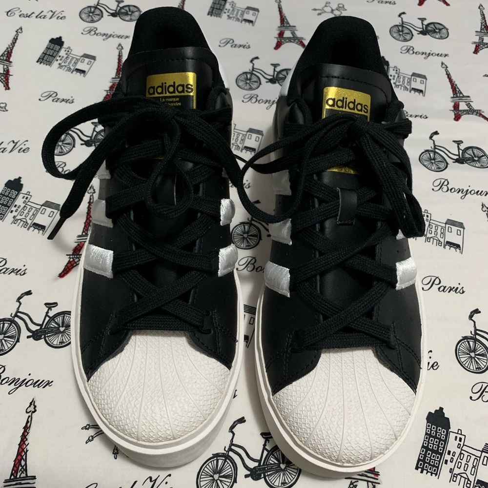 Brand New adidas Black and White Sneakers with Gold Accents